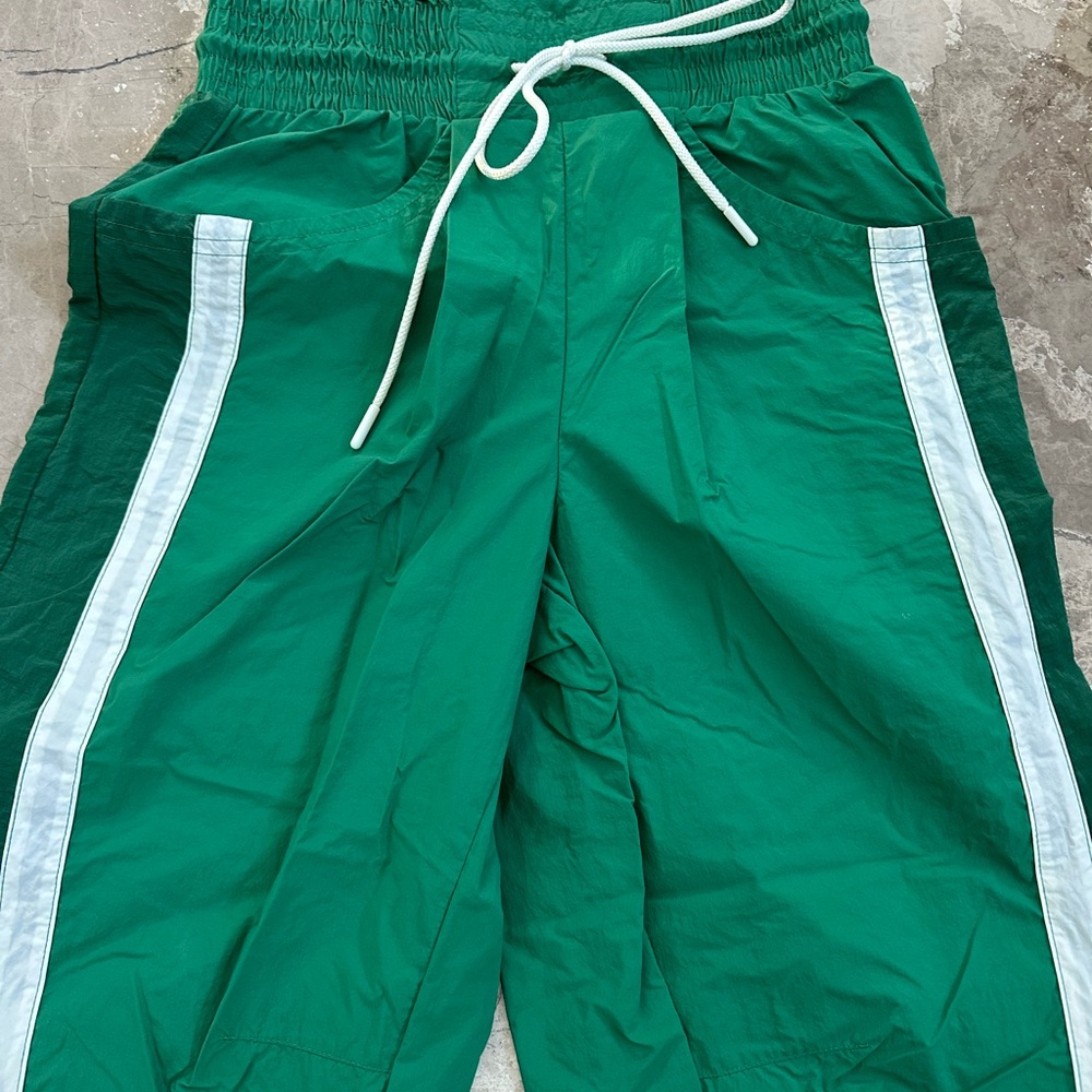 Green Athletic Shorts with White Stripes